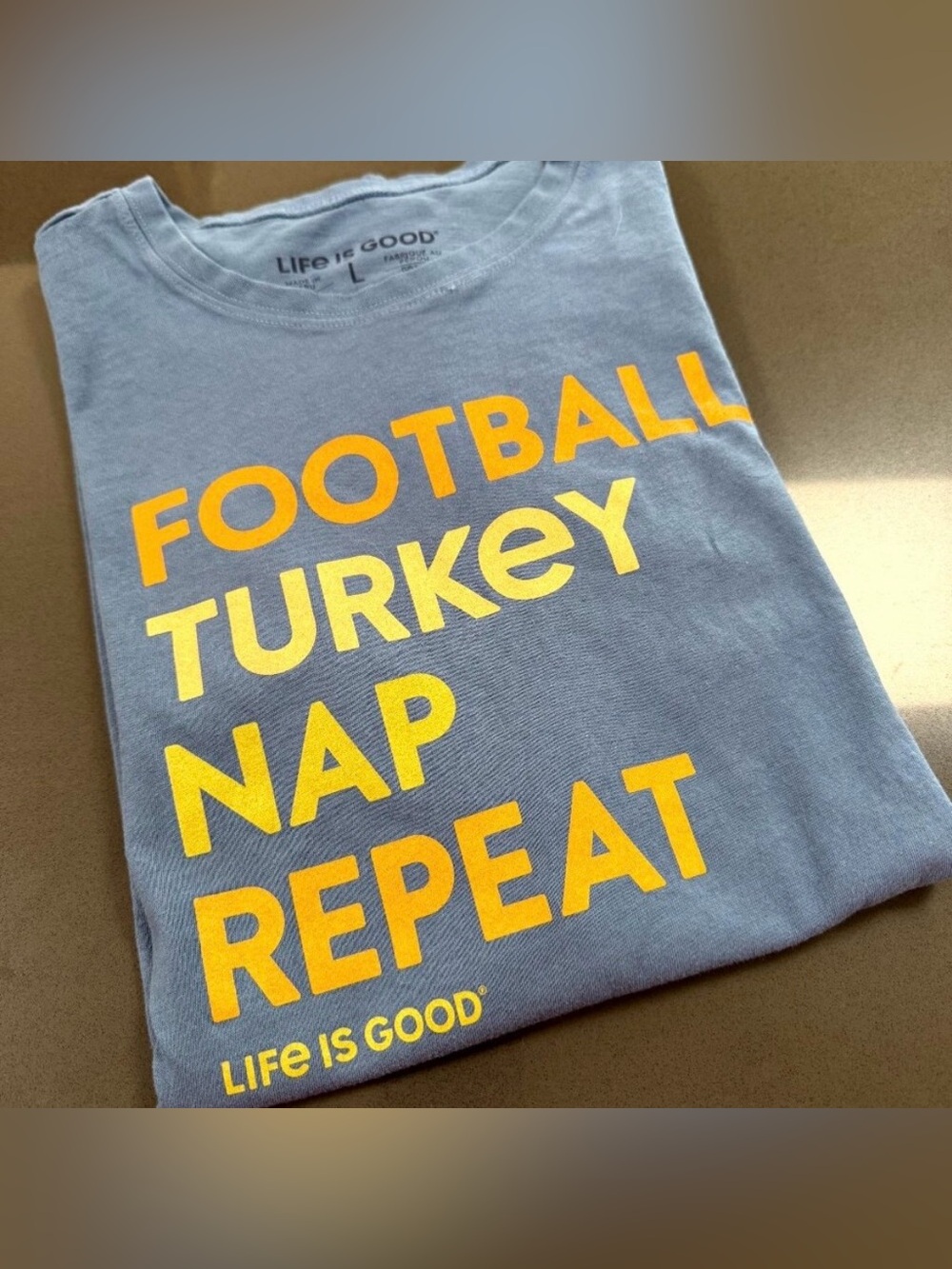 Life Is Good Short Sleeve T‑Shirt in Light Blue with Yellow Text